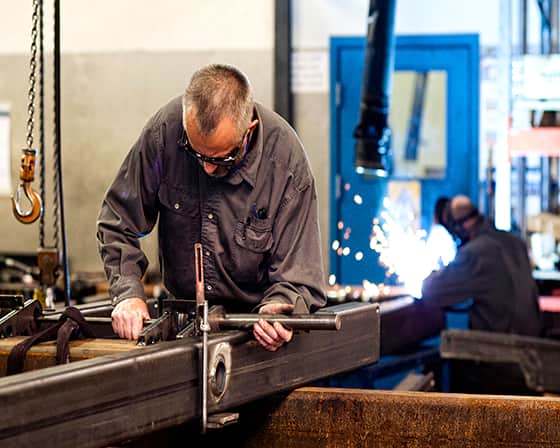 translyft employee working on a lifting table